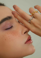 wearing Mini Structure Rings in gold and silver